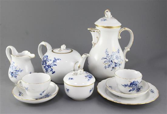 A Meissen blue and gilt decorated floral tea and coffee set for twelve place settings, 20th century, coffee pot 26.5cm (50)